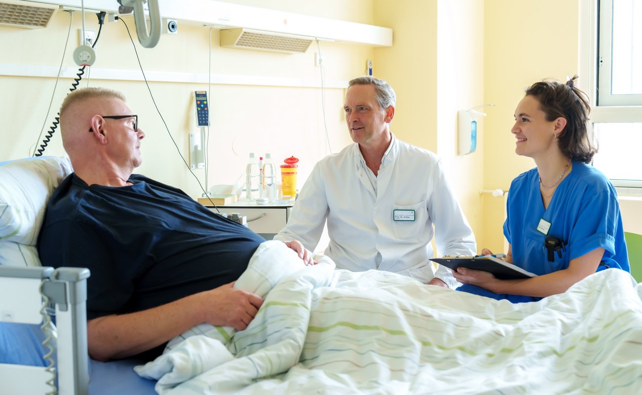 Visite am Patientenbett.